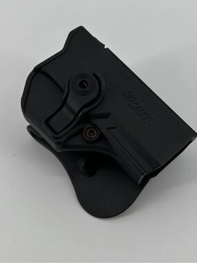 Sig Sauer P250-P320 .45 ACP paddle holster, with trigger guard lock.